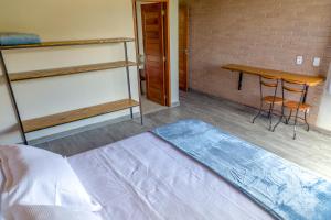 Cama ou camas em um quarto em Villaggio Ronchi
