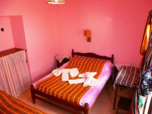 Postel nebo postele na pokoji v ubytování Hostal La Soñada + 8 fotografií