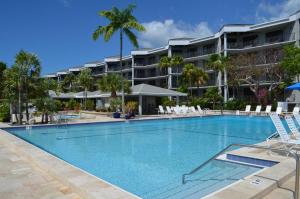 a swimming pool in front of a resort at Key West's Best in Key West