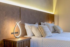 Postel nebo postele na pokoji v ubytování Hotel Pousada Kaster