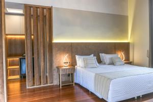 Postel nebo postele na pokoji v ubytování Hotel Pousada Kaster