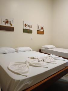 Ένα ή περισσότερα κρεβάτια σε δωμάτιο στο Pousada Águas do Jalapão