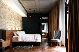 Una cama o camas en una habitación de Hotel Plaza de Armas