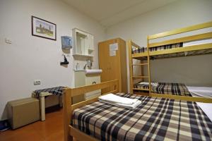 Postel nebo postele na pokoji v ubytování Hostel 42