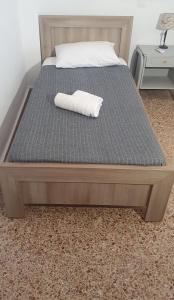 A bed or beds in a room at Toulipa Lindos