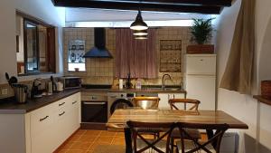 A cozinha ou cozinha compacta de Casa Isabel 2