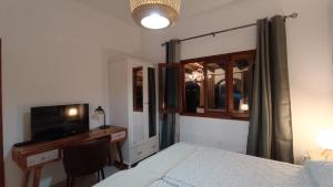 Cama ou camas em um quarto em Casa Isabel 2