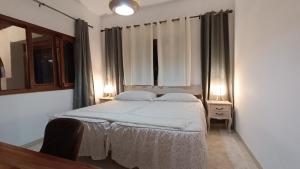 Cama ou camas em um quarto em Casa Isabel 2