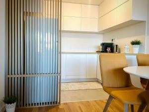 Kuchyň nebo kuchyňský kout v ubytování Apartman Nikol