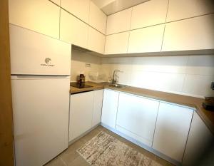 Kuchyň nebo kuchyňský kout v ubytování Apartman Nikol