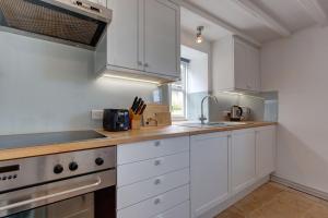 Køkken eller tekøkken på Cley Corner Cottage