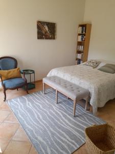 Letto o letti in una camera di La Chambre Verte