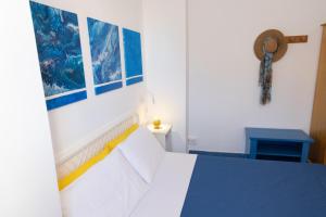 Letto o letti in una camera di L'Aurora Scala Dei Turchi