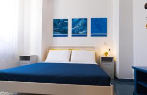 Letto o letti in una camera di L'Aurora Scala Dei Turchi