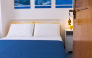 Letto o letti in una camera di L'Aurora Scala Dei Turchi