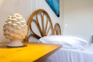 Letto o letti in una camera di L'Aurora Scala Dei Turchi