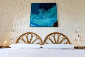 Letto o letti in una camera di L'Aurora Scala Dei Turchi
