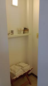 En eller flere senge i et værelse på La Armonia