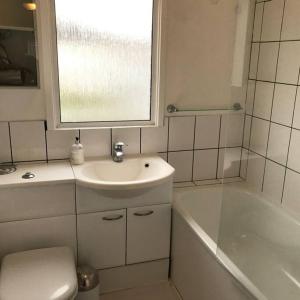 A bathroom at 2 bedroom Temsford Close Apartment