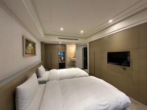 Voodi või voodid majutusasutuse Link World Hotel toas