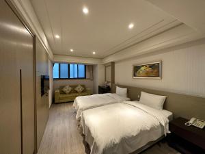 Voodi või voodid majutusasutuse Link World Hotel toas