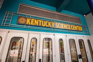 a kentucky science center sign on the front of a building at Luxury 8 Bed/4 Ba NuLu Home Private yard/parking in Louisville