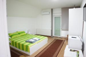 Postel nebo postele na pokoji v ubytování Rooms Busujok