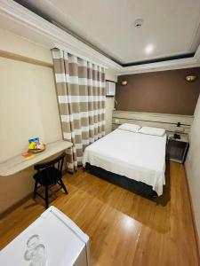 Cama ou camas em um quarto em Gran Chevalier Hotel