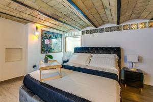 Ένα ή περισσότερα κρεβάτια σε δωμάτιο στο Oliviero - Piazza Navona Apartment
