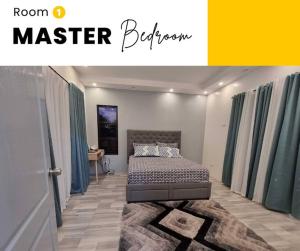 Ένα ή περισσότερα κρεβάτια σε δωμάτιο στο At Home With Kajea