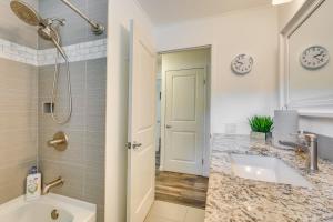 a bathroom with a sink and a shower at 2 Mi to Town and Beach! Lovely Kailua-Kona Home in Kailua-Kona +16 photos