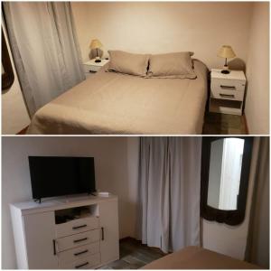 - une chambre avec un lit et une télévision sur une commode dans l'établissement LA INESITA, à Santa Ana
