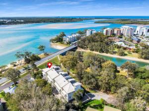 an aerial view of a city and the water at Beachside One Bedroom Flat Retreat in Maroochydore