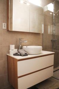 a bathroom with a sink and a shower at Villa Christina 2 in Ohrid +28 photos