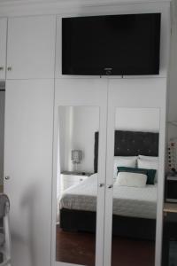 Postel nebo postele na pokoji v ubytování Alexia Room