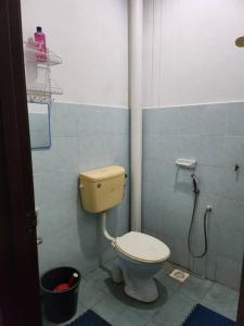 a bathroom with a toilet in a stall at D'Haja 6 KLIA Sepang with 3 AC & FREE Wi-Fi in Banting +7 photos
