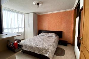 Postel nebo postele na pokoji v ubytování Apartamento acogedor, excelente ubicación