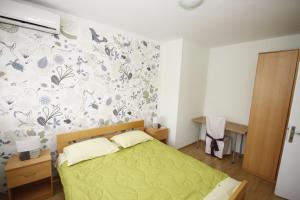 Posteľ alebo postele v izbe v ubytovaní City Center Accommodation