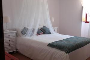 Ένα ή περισσότερα κρεβάτια σε δωμάτιο στο Vale do Boto-Quinta com 3 casas