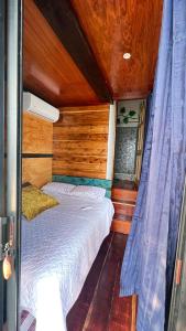 Ein Bett oder Betten in einem Zimmer der Unterkunft Mayan Spirit