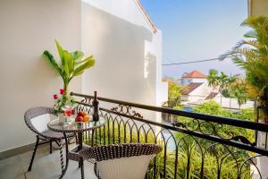 Balkón nebo terasa v ubytování HAI DAO HOI AN VILLA