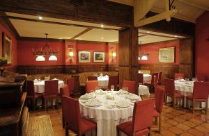 Um restaurante ou outro lugar para comer em Hotel Posada Los Alamos