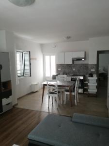 Kuchyň nebo kuchyňský kout v ubytování Apartment