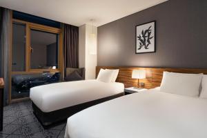 Staz Hotel Ulsan客房内的一张或多张床位