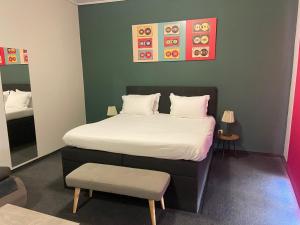 Ένα ή περισσότερα κρεβάτια σε δωμάτιο στο Connect Suites