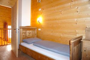 Posteľ alebo postele v izbe v ubytovaní Bergchalet Refugium Martius