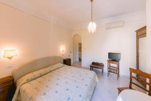 Кровать или кровати в номере Hotel Toro