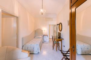 Кровать или кровати в номере Hotel Toro