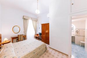 Кровать или кровати в номере Hotel Toro