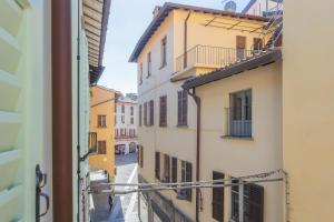 a view of an alley from a building at Antiche Mura Como by Rent All Como in Como